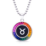 Necklace with a Taurus zodiac symbol pendant featuring a rainbow-colored border on a white background.