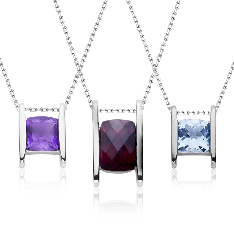 Three silver necklaces with Amethyst  gemstone pendants on a white background