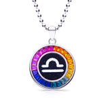 Necklace with a colorful zodiac Libra pendant on a white background