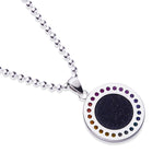 Necklace with a round pendant featuring a black center and colorful dots on a white background