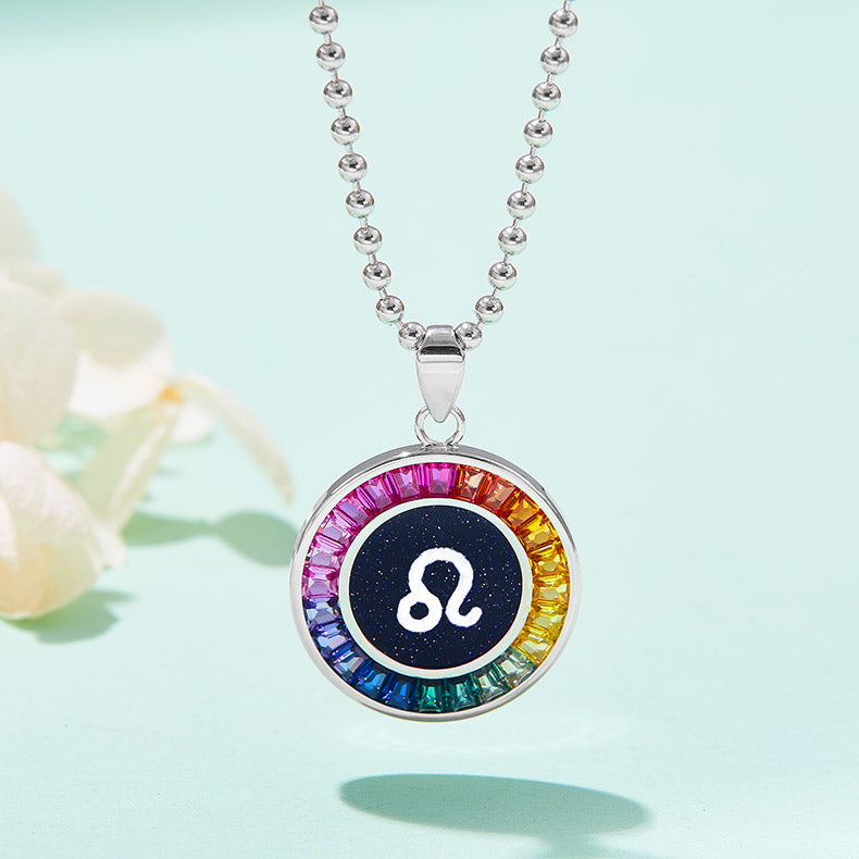 Necklace with a colorful leo pendant featuring a zodiac symbol on a light blue background