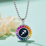Necklace with a colorful Sagittarius Zodiac pendant featuring an astrological symbol on a light green background.