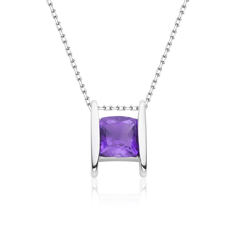 Silver necklace with a purple Amethyst  gemstone on a white background