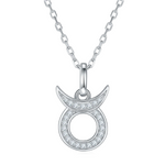 Silver necklace with a crescent moon and circle pendant on a white background