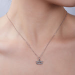 Silver necklace with a Aquarius Zodiac Pendant on a model