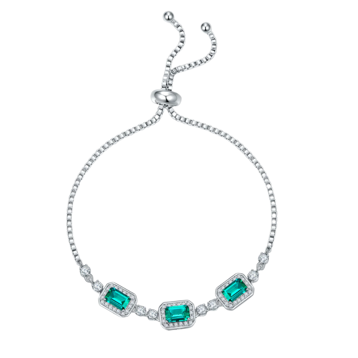 Silver bracelet with emerald green gemstones on a white background
