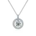 Silver necklace with a round diamond pendant on a white background
