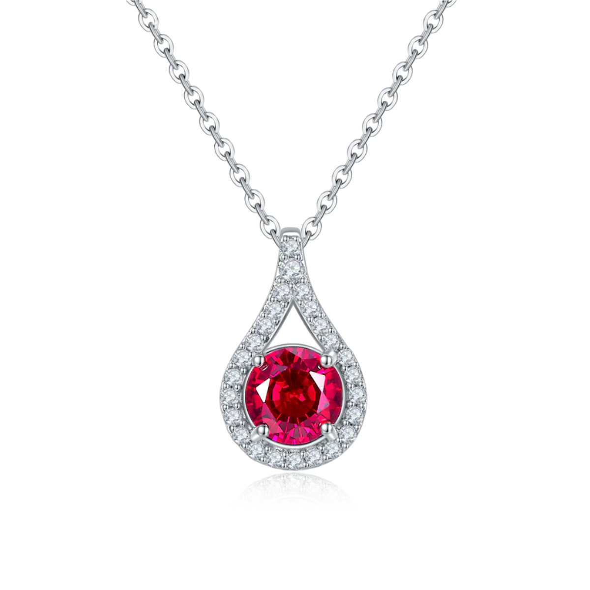 Teardrop-shaped pendant with a red gemstone and diamond accents on a white background