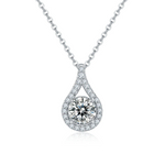 Teardrop-shaped diamond necklace on a white background