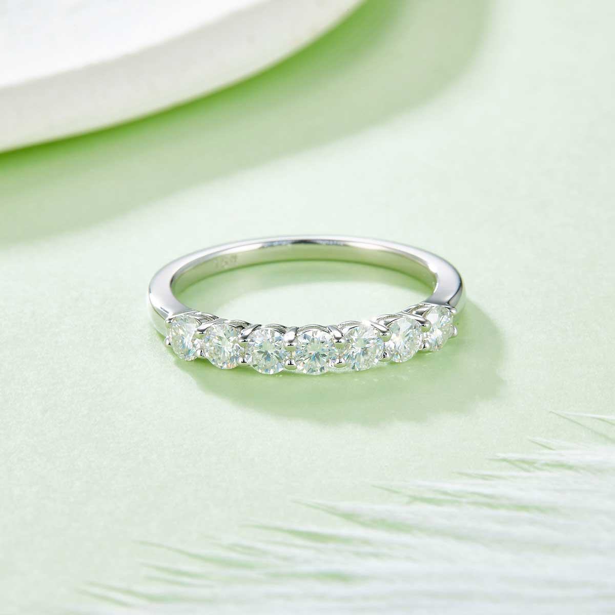 Round moissanite band front angled view