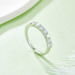 Round moissanite band side profile