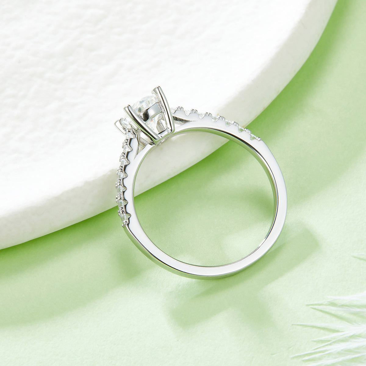 Oval pave ring side profile and raised setting