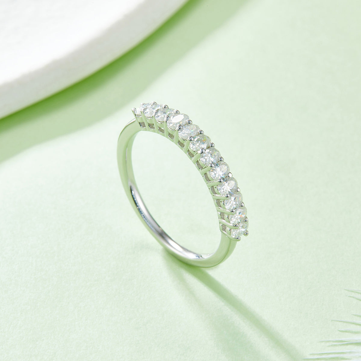 Oval moissanite anniversary band angled view