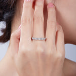 Oval anniversary band shown on hand