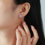 Round moissanite halo stud earring lifestyle view