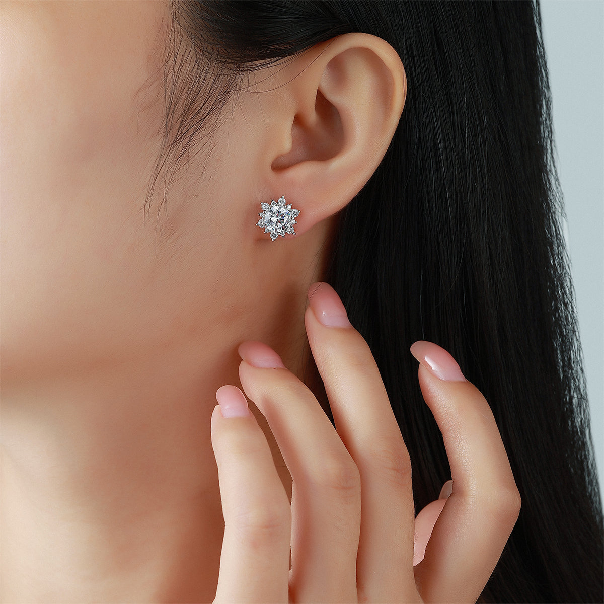 Round moissanite halo stud earring lifestyle view