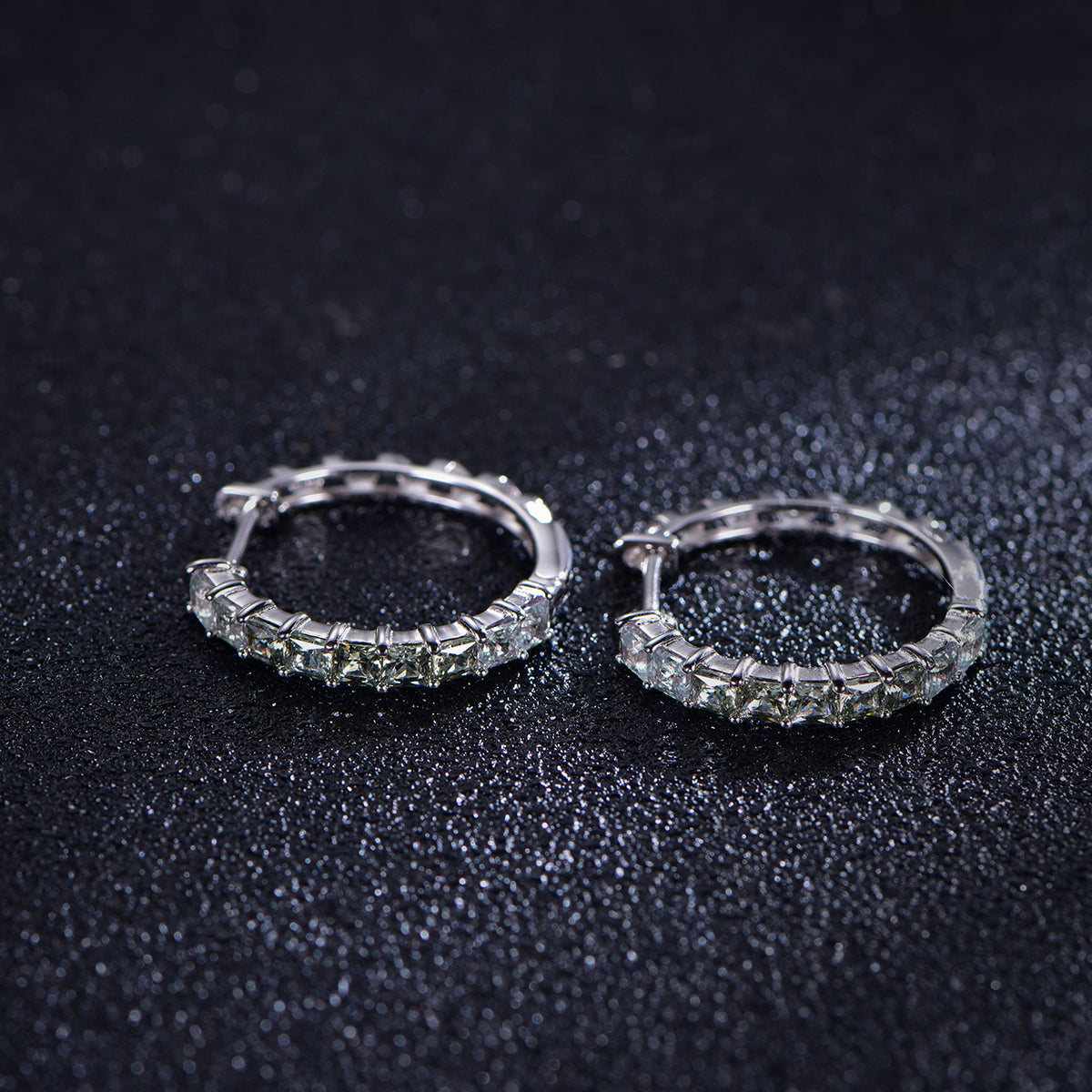 Green gradient hoop earrings showing side and front